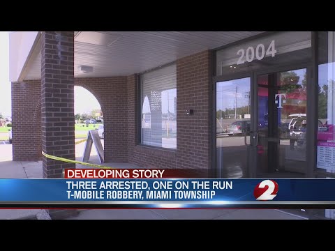 Three in custody, one on the run, after cell phone store robbery