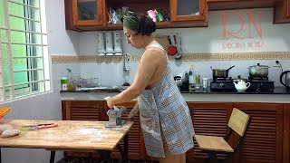 Download lagu Ravioli Time A housekeeper works in the kitchen ho... mp3