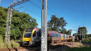 Queensland Rail's 177/265 works on run TL11 arriving into Woombye station on Mon Apr 7 at ped x-ing