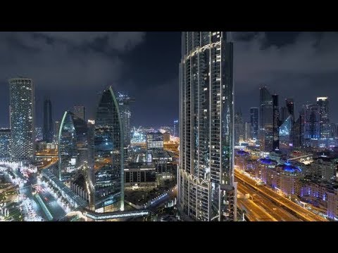 Illuminated City Skyline Buildings and Roads at Night | Stock Footage - Videohive