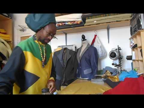 Ras Nyto in his work shop sewing