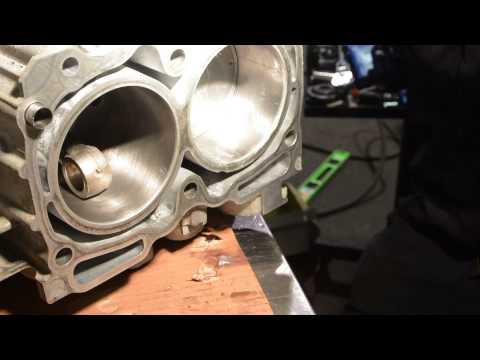 Installing pistons in 2007 Subaru Impreza at Sorenson Automotive Inc