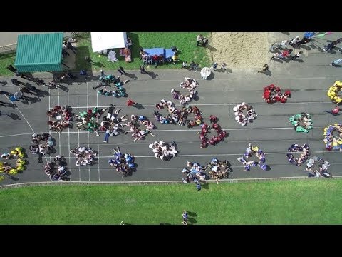 Sports Competitions Between Children. Mass Event of Children on the Sports Field. Sports Games |