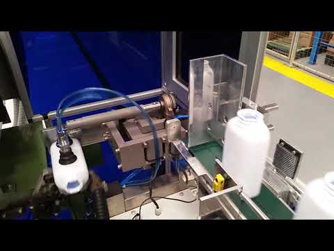 High Speed Automation- Pharmaceutical Bottle Handling System onto conveyor & then through inspection