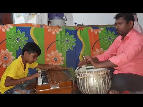 Harmonium player chamupathi