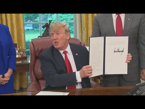 Trump signs executive order to reverse his immigration policy