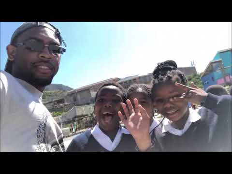 African American trying to speak xhosa to beautiful kids in South Africa...