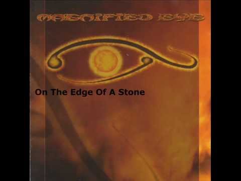 Magnified Eye - On The Edge Of A Stone