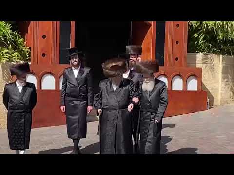 Belzer Rebbe Leaving His Shul Compound On His Way To Sheva Brochos