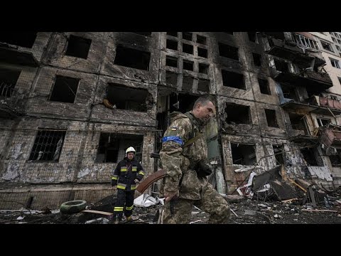 Aftermath of a deadly attack on a residential block in Kyiv