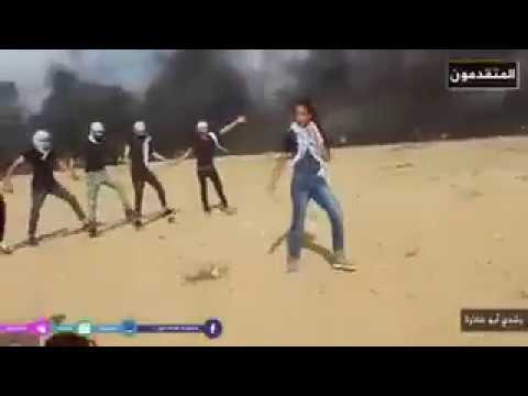 Palestinians Perform Palestinian Dabke in front of the Israeli snipers