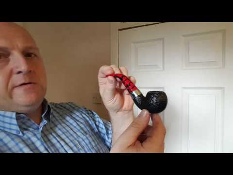 Peterson Dracula pipe sandblasted 03 and 221.