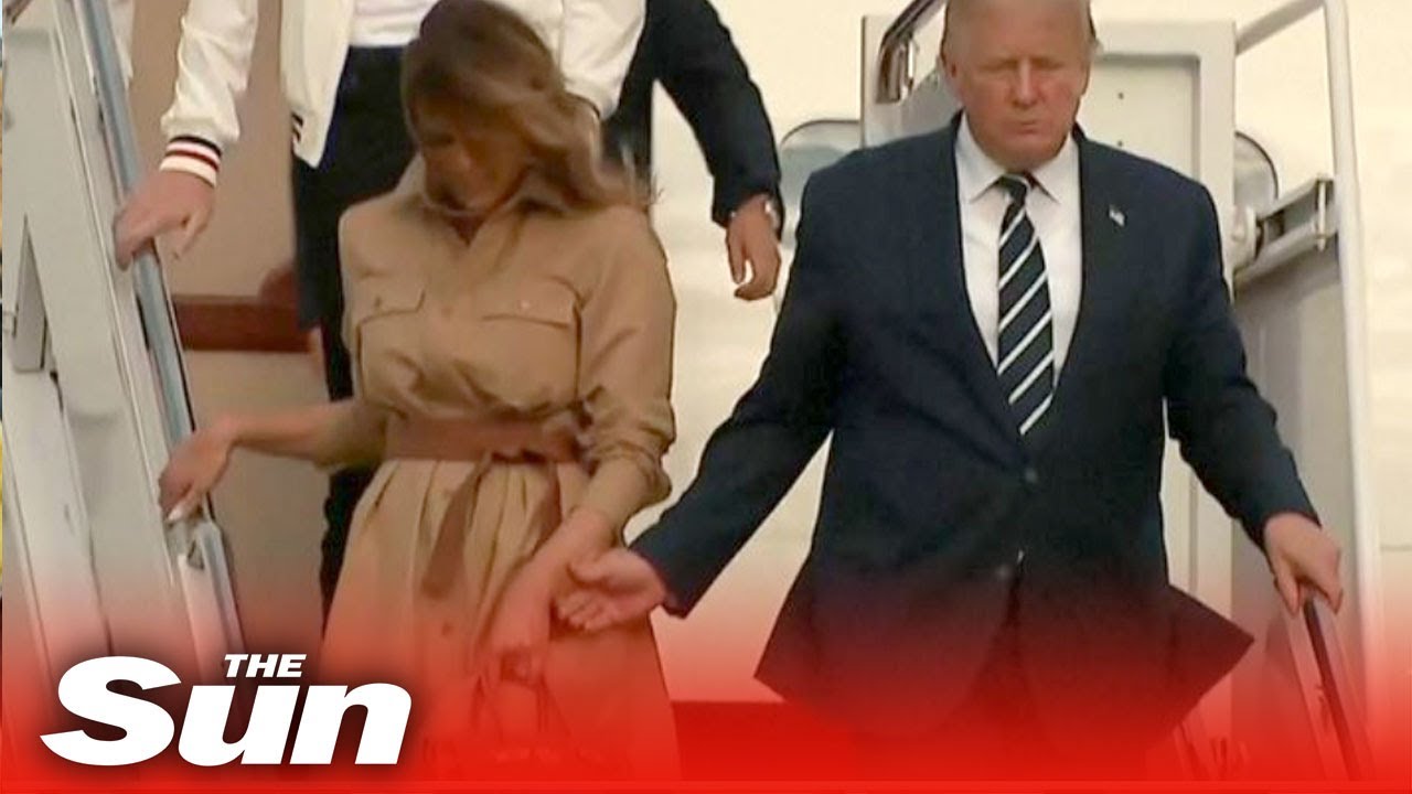 Melania refuses to hold Trump's hand stepping off Air Force One thumnail