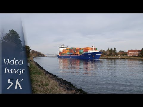 Rendsburg, Germany: Kiel Canal (Nord-Ostee-Kanal), Container Ship "EMPIRE" - 5K UHD Video (2880p)