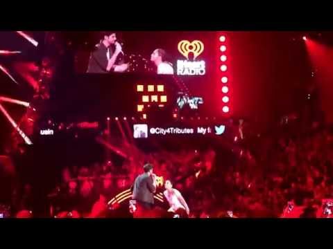 Jennifer Lopez and Alvaro Soler signing El Mismo Soul at iHeart Radio Music Festival 2015 Night 2
