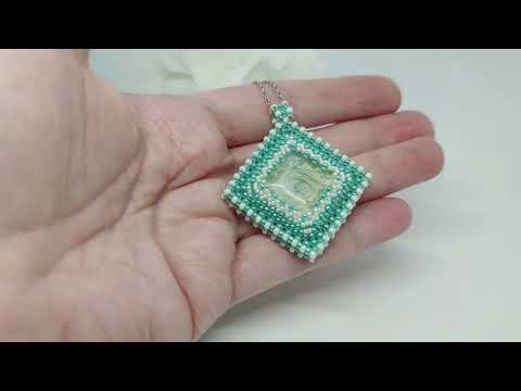 Beaded cube pendant with resin caboshon in turquoise color