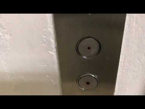 1984 Dover Classic (Mod by TK) Hydraulic Garage Elevator at 1285 W Broadway in Vancouver BC