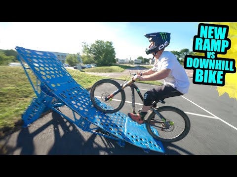RIDING MY NEW BIG KICKER RAMP ON THE DOWNHILL BIKE!