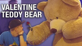 Giant Teddy Bear Hands Out Flowers
