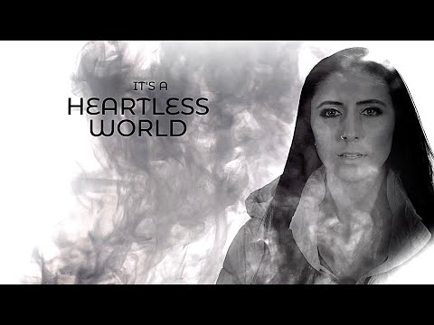 UNLEASH THE ARCHERS - Heartless World (Official Lyric Video) | Napalm Records online metal music video by UNLEASH THE ARCHERS