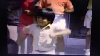 Sesame Street -- A little Boy flapping his Elbows and knocking his Knees together