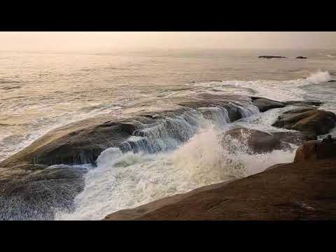Sea water flows over Rock at Someshwara Beach