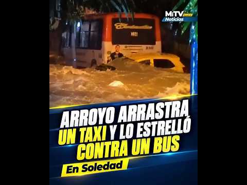 Arroyo arrastra un taxi y lo estrelló contra un bus en Soledad