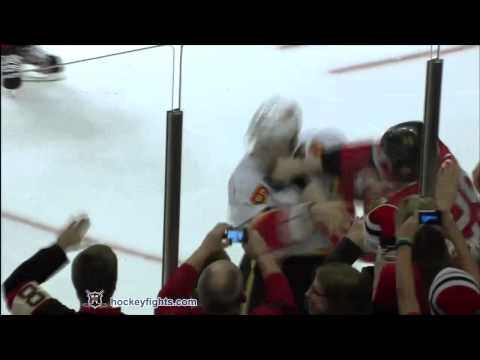 Cory Sarich vs Bryan Bickell Dec 18, 2011