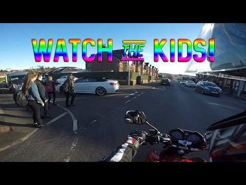 Impatient driver endangers kids.