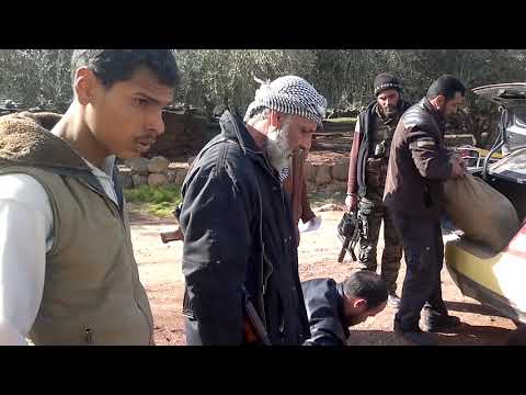 استلام شحنة أسلحة مقدمة من المجلس العسكري في درعا إلى لواء درع اللجاة ضمن معركة عامود حوران