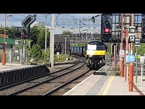 4M25 - DB90s - Bumblebee1 leading Malcolm through a sunny but windy Stafford station 20 mins early