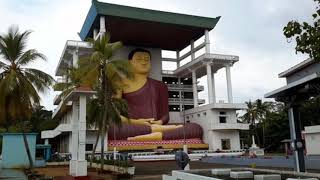 preview picture of video 'Travel in sri lanka with matara weherahena Buddhist temple. මාතර වේරහේන රජමහා විහාරය.'