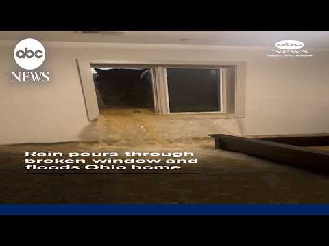 Rain pours through broken window and floods Ohio home
