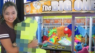 Winning BIG prizes from the giant claw machine!