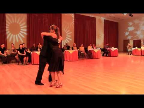  Fausto Carpino  and  Stephanie Fesneau  are  dancing  to  a  tango  at  Kiev International Tango Festival  in  2014