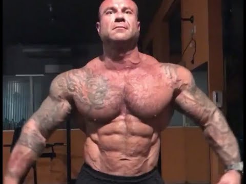 Bodybuilder Hairy Muscle Daddy Flexing And Vacuum Abs