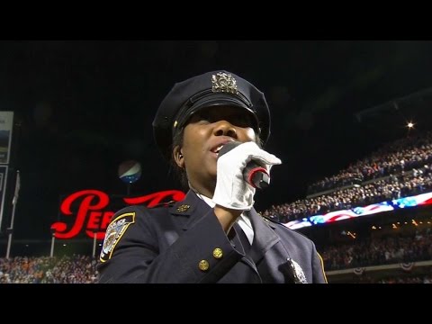 WS2015 Gm4: NYPD officer sings 'God Bless America'