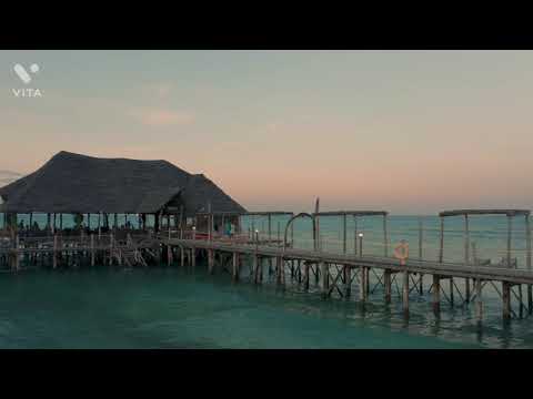 Drone footages of beach with restaurant
