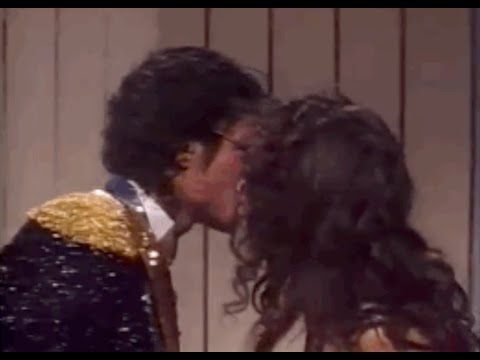 Michael Jackson & Irene Cara kiss backstage at the 26th Annual Grammy Awards (February 28, 1984)