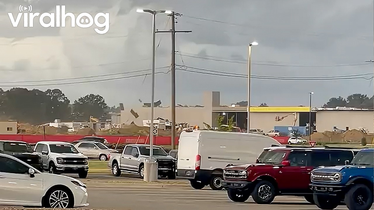 Strong Winds Blow Roof Off Building || ViralHog