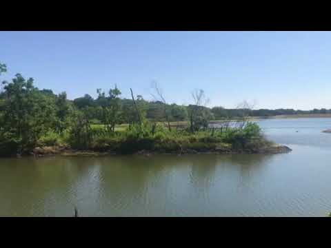 a view of the lake from this camping area