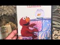 2 Different Versions Of Elmo S World