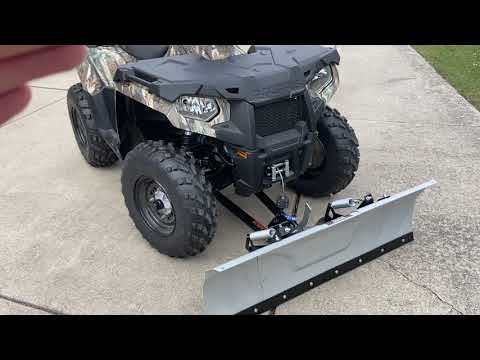 Sportsman 570 with Kolpin ATV snowplow