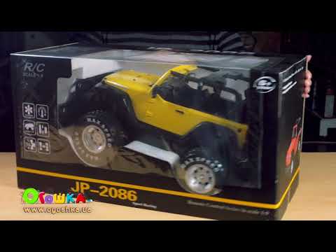 Видео обзор Автомобиль на радиоуправлении Jeep Rubicon, 1:9 (желтый)