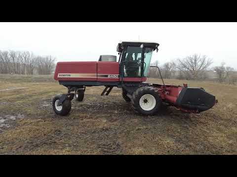 Hesston 8450 Swather, 16’ Header, 1,894 ehrs, 1,234 chrs