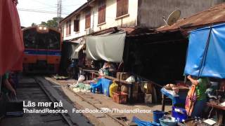 preview picture of video 'Railway Food Market. Maeklong, Samut Songkhram Provins Thailand'