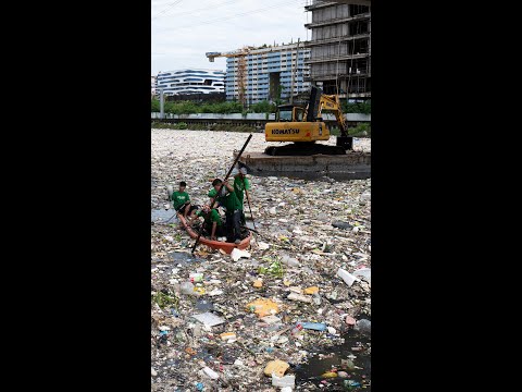 Monsoon rains flood Philippine waterways with trash