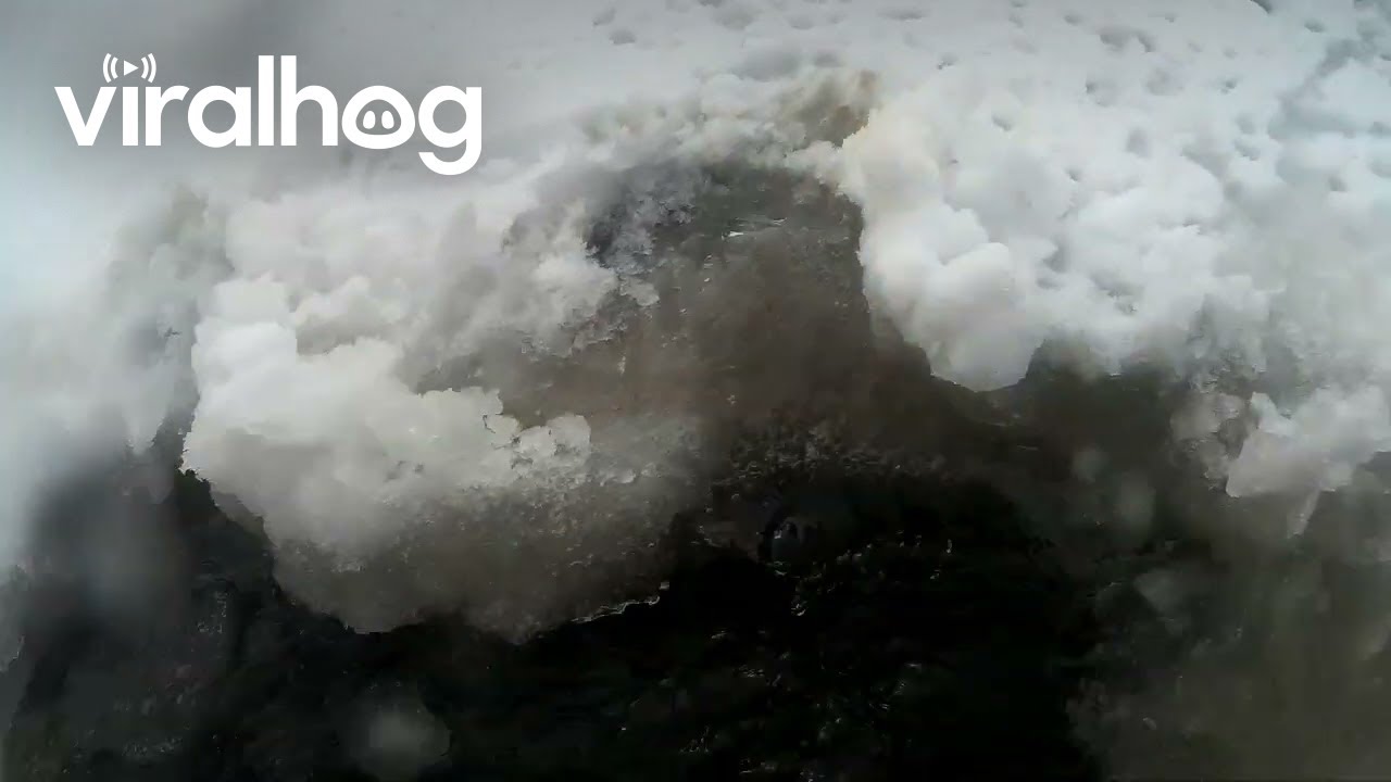 Motorcycle Breaks Through Frozen Lake and Sinks || ViralHog