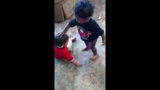 Two baby's fight over toy car