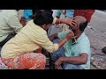Young Lady Barber Shaving Men Headshave